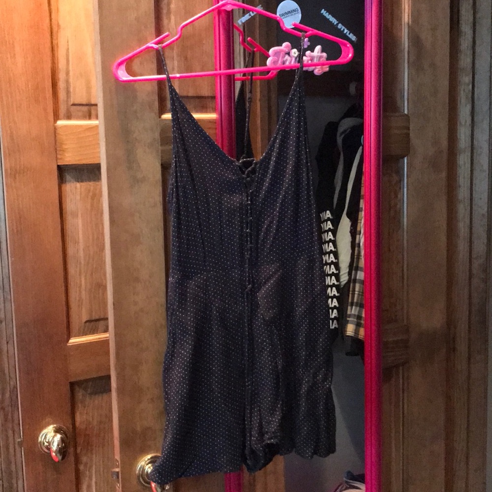 Black polka dotted romper